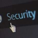 Close-up of a cursor hovering over digital security text on a screen, representing zero trust cybersecurity